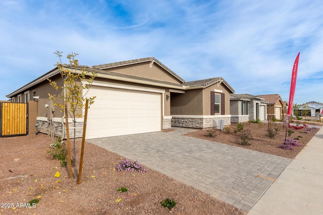 ranch-style home featuring a garage