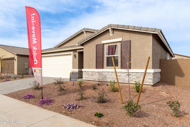 view of front of home with a garage