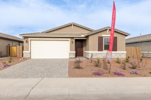 view of front of home with a garage