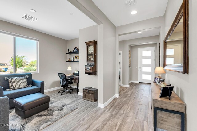 interior space with light hardwood / wood-style floors