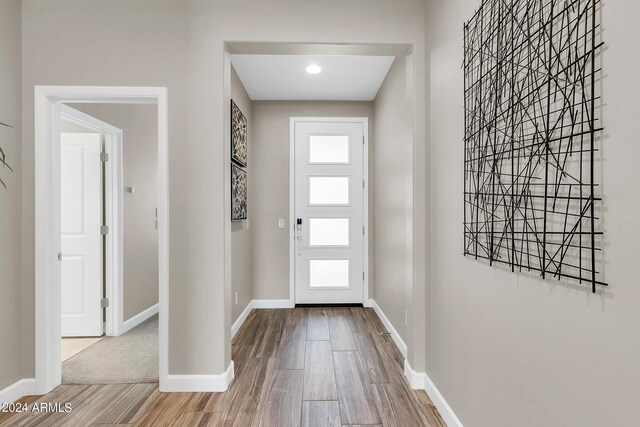 doorway featuring light wood-type flooring