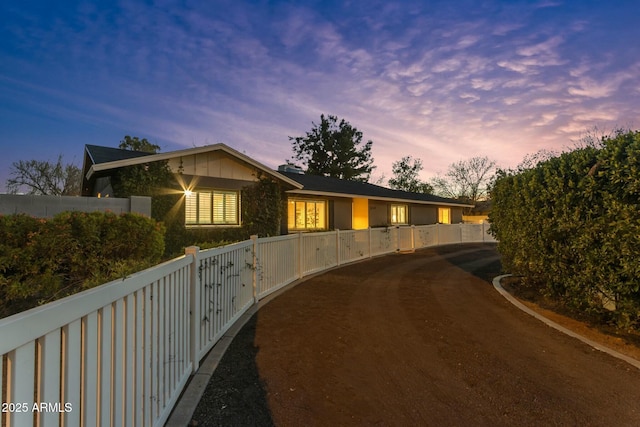 view of property exterior at dusk