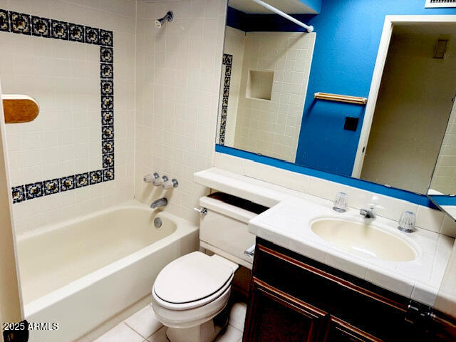 4727 E Euclid Ave, Phoenix, AZ 85044 - bathroom with toilet, bathing tub / shower combination, vanity, and tile patterned flooring