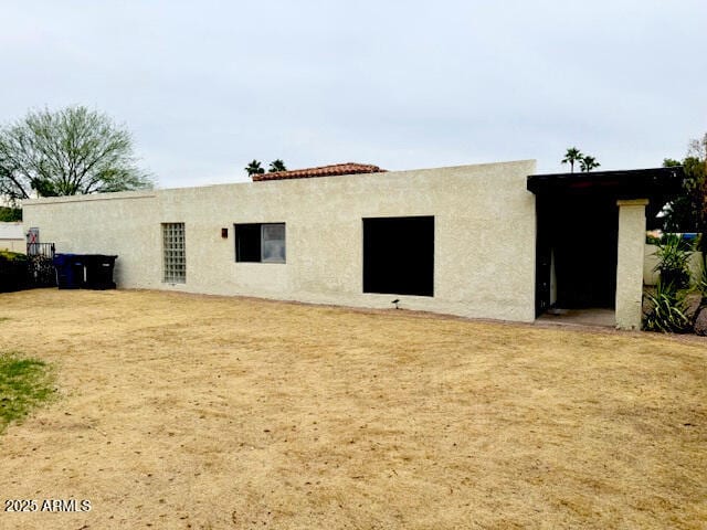 4727 E Euclid Ave, Phoenix, AZ 85044 - back of house featuring stucco siding