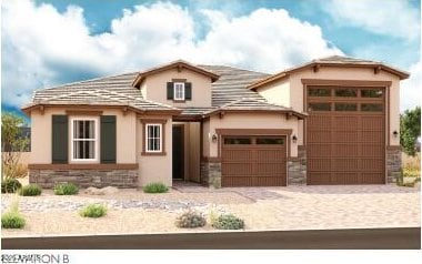 20158 W Monterey Way, Buckeye, AZ 85396 - view of front facade featuring stone siding, stucco siding, a garage, and driveway
