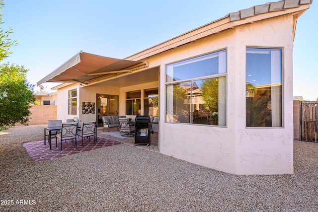 back of house featuring a patio