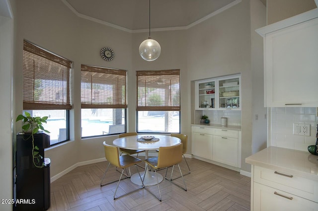 1750 E Mallory St, Mesa, AZ 85203 - dining space with crown molding and healthy amount of natural light