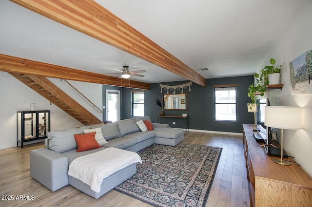 1750 E Mallory St, Mesa, AZ 85203 - living room with stairs, wood-type flooring, beam ceiling, and a ceiling fan