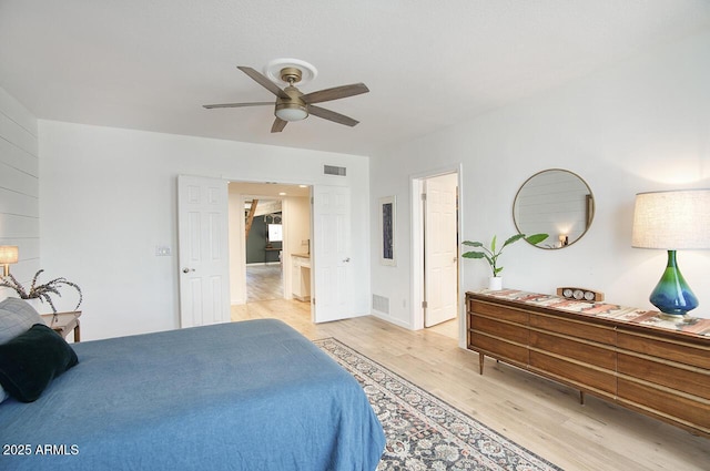 1750 E Mallory St, Mesa, AZ 85203 - bedroom with light wood finished floors and a ceiling fan