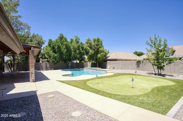 1750 E Mallory St, Mesa, AZ 85203 - view of pool featuring a putting area, a patio area, and a fenced backyard