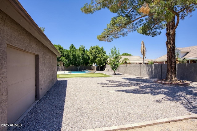 1750 E Mallory St, Mesa, AZ 85203 - fenced backyard with a patio area