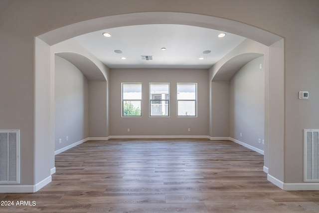 empty room featuring hardwood / wood-style floors