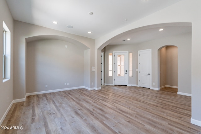 entrance foyer featuring light wood-type flooring