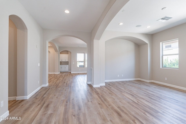 interior space with a healthy amount of sunlight and light hardwood / wood-style floors