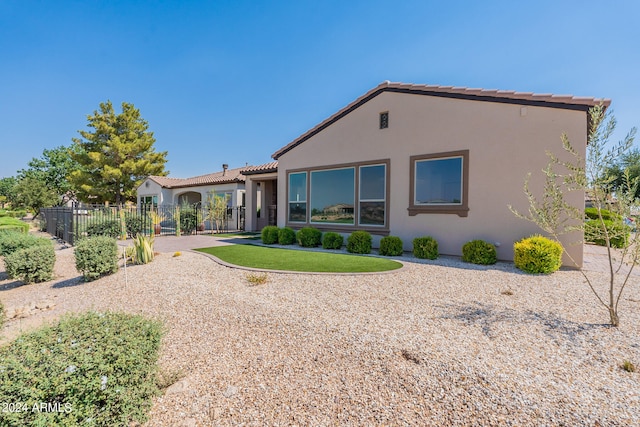 view of front of home with a front lawn