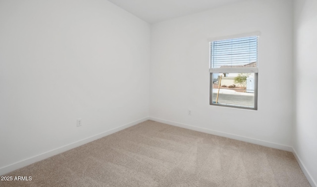 spare room with carpet floors