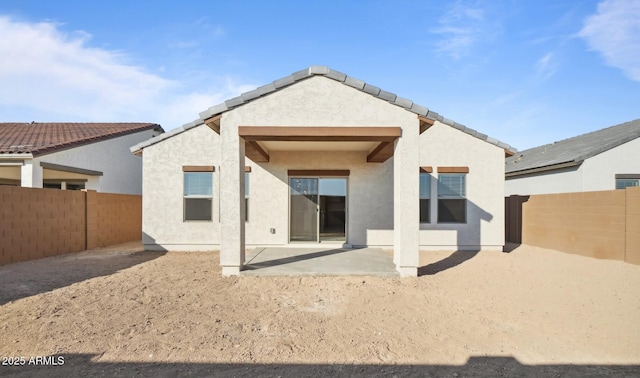 back of house featuring a patio