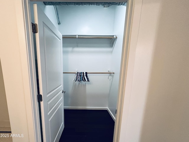 114 W Adams St Unit 302, Phoenix, AZ 85003 - walk in closet with dark wood-type flooring
