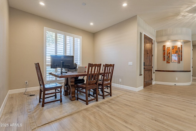 dining area featuring recessed lighting, baseboards, and wood finished floors