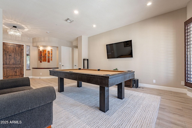 rec room featuring recessed lighting, light wood-style floors, visible vents, and baseboards