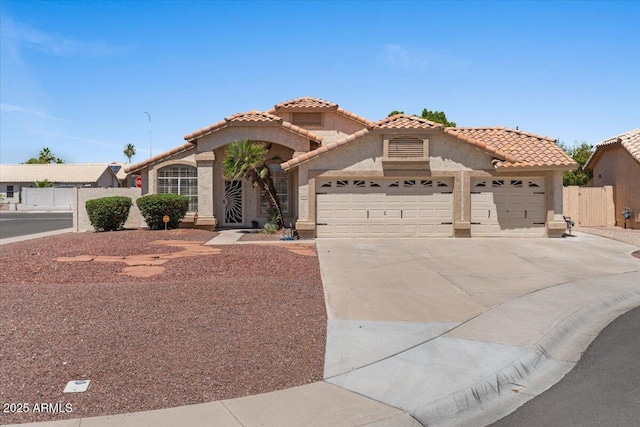 1030 S Brentwood Ct, Chandler, AZ 85286 - mediterranean / spanish-style house with an attached garage, stucco siding, and a tiled roof