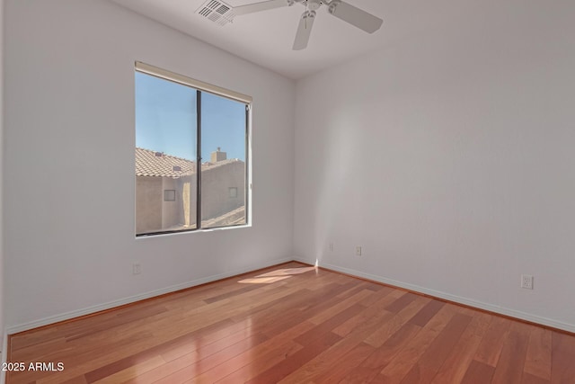 16600 N Thompson Peak Pkwy Unit 1072, Scottsdale, AZ 85260 - empty room featuring light wood-type flooring, a ceiling fan, baseboards, and visible vents