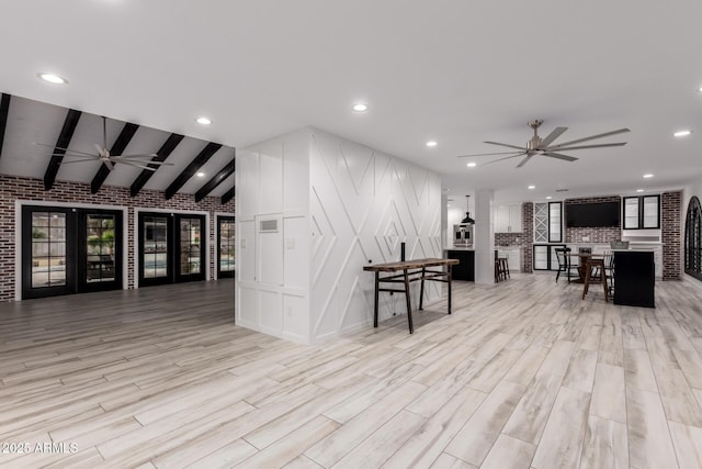 playroom with vaulted ceiling with beams, light wood-type flooring, ceiling fan, and recessed lighting