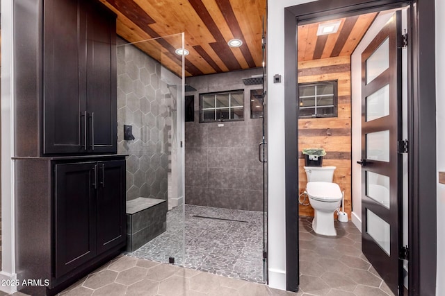 bathroom with toilet, tile patterned floors, a walk in shower, and wood ceiling