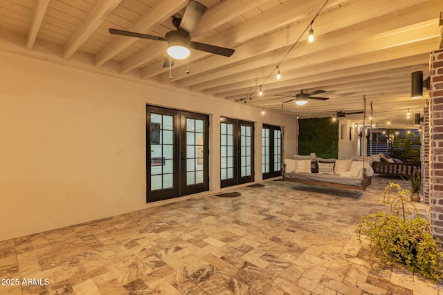 interior space featuring french doors and a ceiling fan