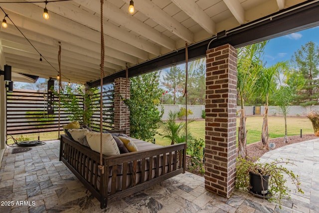 view of patio with outdoor lounge area and a fenced backyard