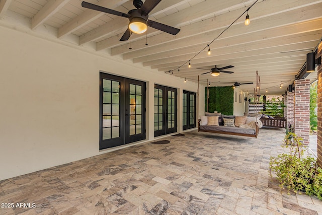 view of patio with ceiling fan and french doors