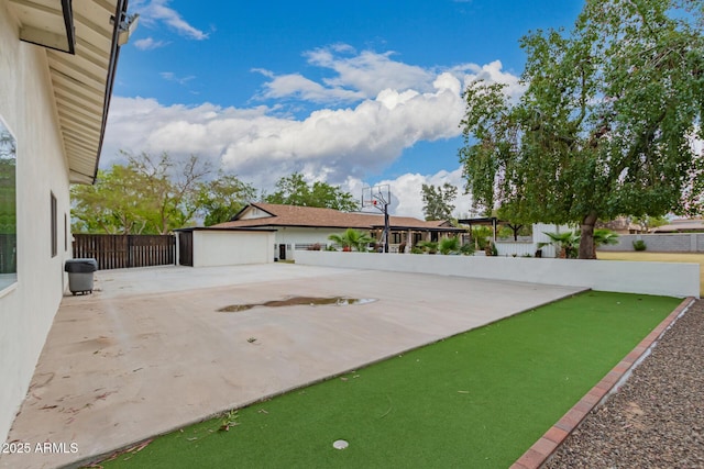 view of patio / terrace with fence