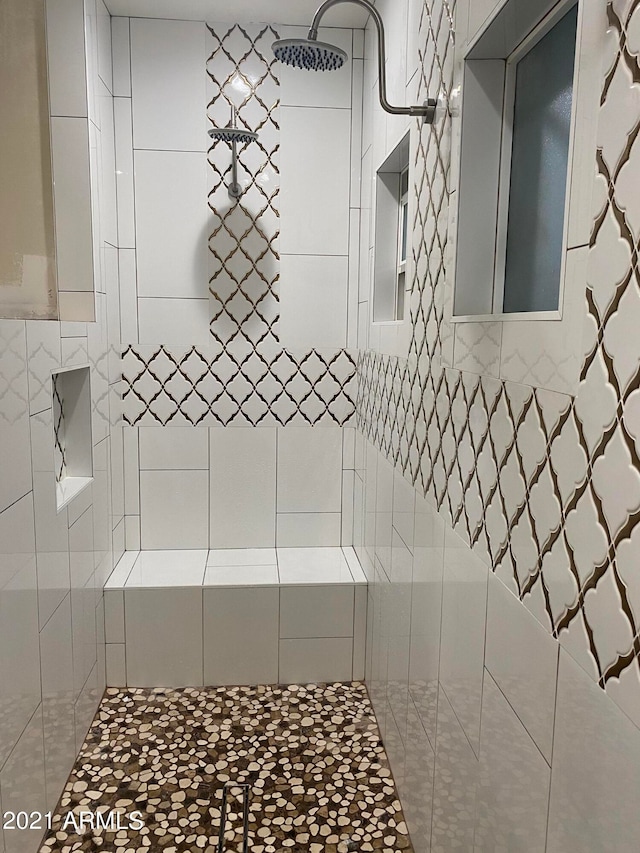 bathroom featuring tile walls