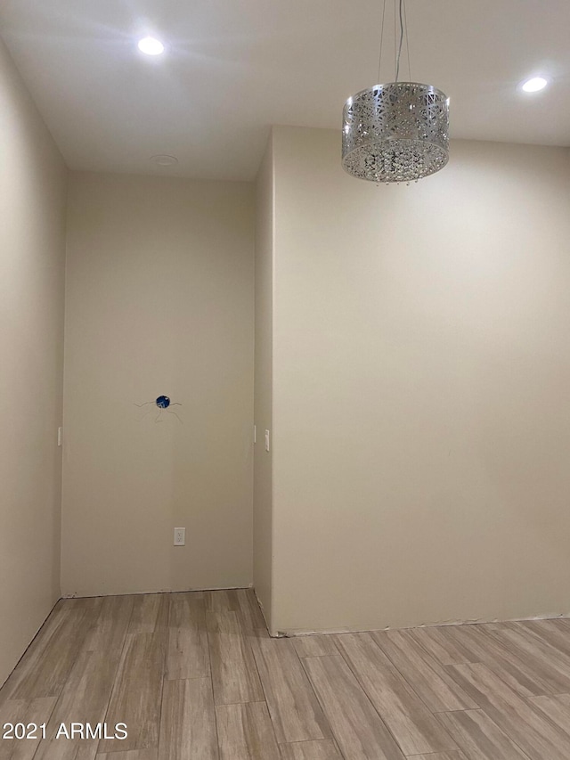 empty room with wood-type flooring