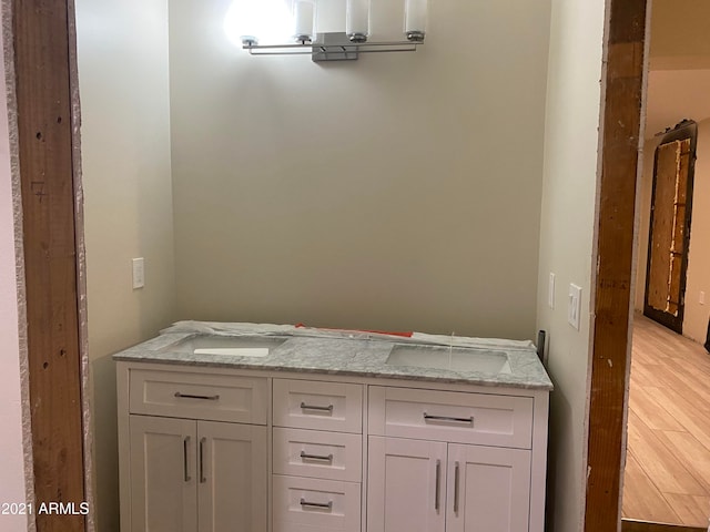 bathroom featuring hardwood / wood-style floors