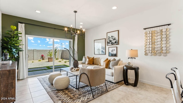 living room featuring a chandelier and light tile patterned flooring