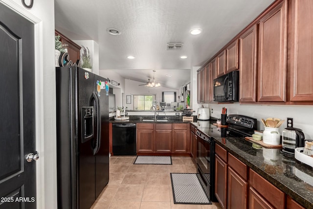 2223 S Hughes Dr, Buckeye, AZ 85326 - kitchen with black appliances, a sink, light tile patterned floors, lofted ceiling, and ceiling fan