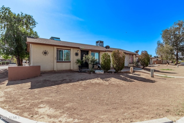 single story home with stucco siding