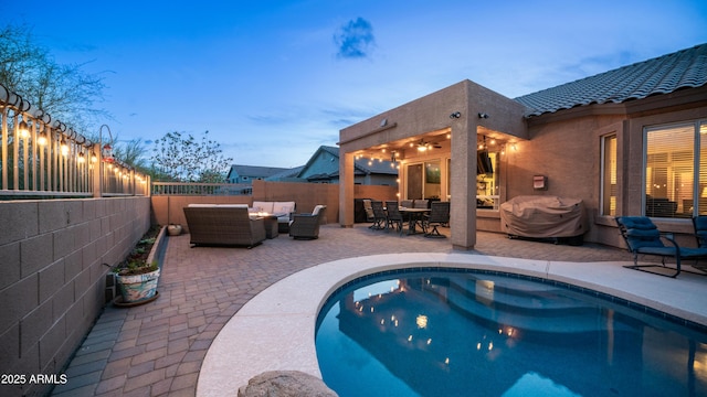 view of pool featuring outdoor lounge area, grilling area, a fenced backyard, a patio area, and outdoor dining space