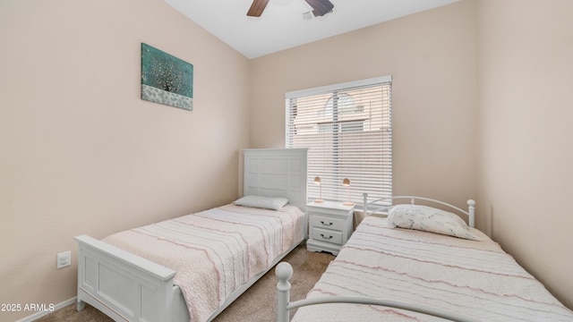 carpeted bedroom with a ceiling fan