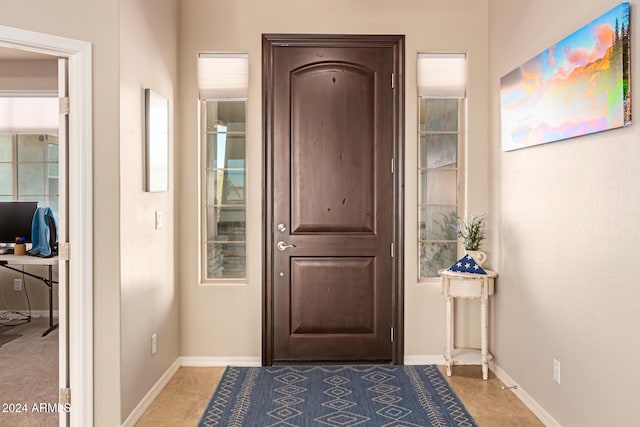 doorway featuring tile patterned floors