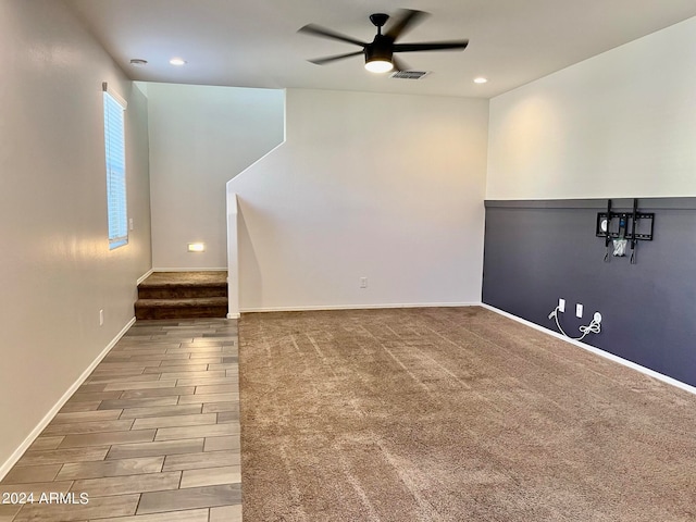 unfurnished room featuring hardwood / wood-style flooring and ceiling fan