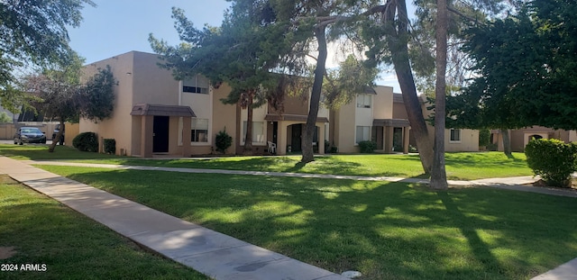 exterior space featuring a front lawn