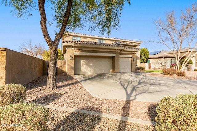 view of front of house with a garage