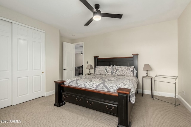 bedroom featuring light carpet and ceiling fan