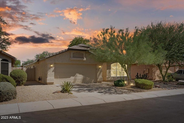 view of front of property featuring a garage