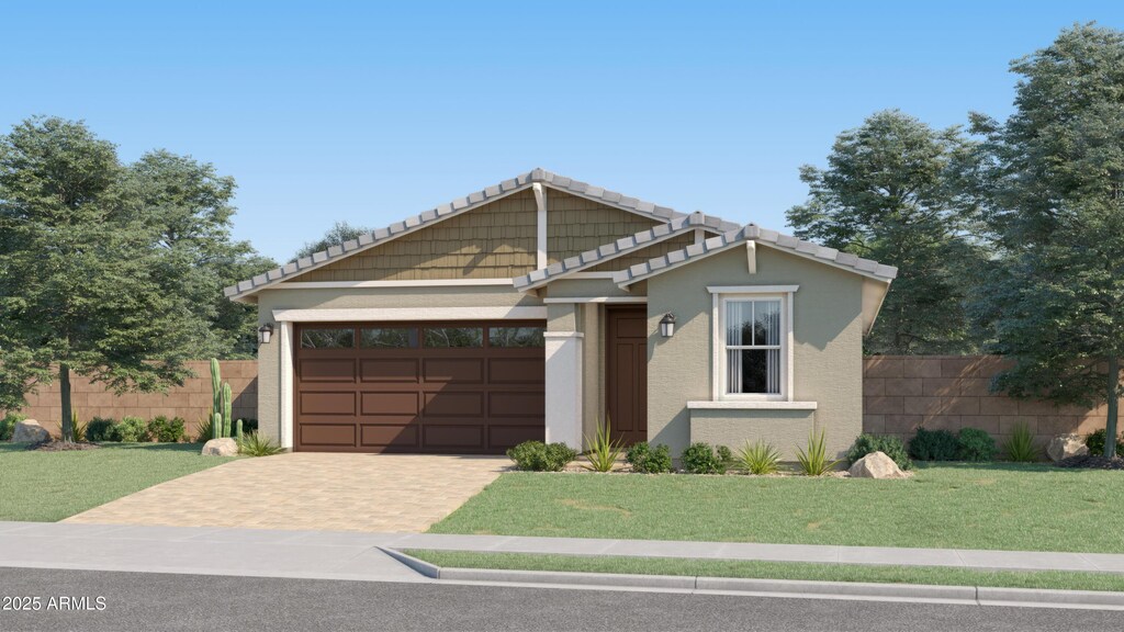 4975 S 233rd Dr, Buckeye, AZ 85326 - view of front of house featuring a garage, fence, driveway, and a front yard