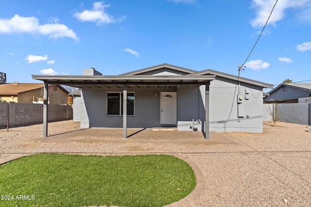 view of front of home with a patio