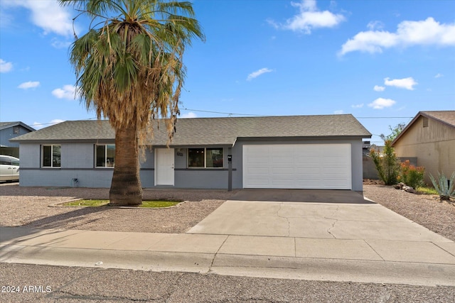 single story home featuring a garage