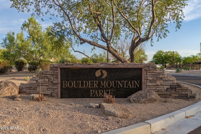 view of community sign